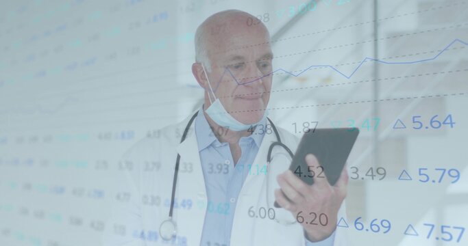 Reviewing doctor analyzing translucent figures on tablet in medical hallway, with stethoscope, mask - Powered by Adobe