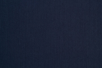 The texture of the background of a suit made of fabric. Background texture in your project.