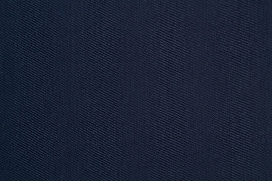 The texture of the background of a suit made of fabric. Background texture in your project.