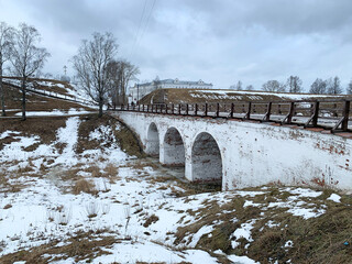 Belozersk, Vologda region, Russia, February, 19, 2020. The old bridge and ramparts of the ancient Kremlin in the city of Belozersk. Russia, Vologda region