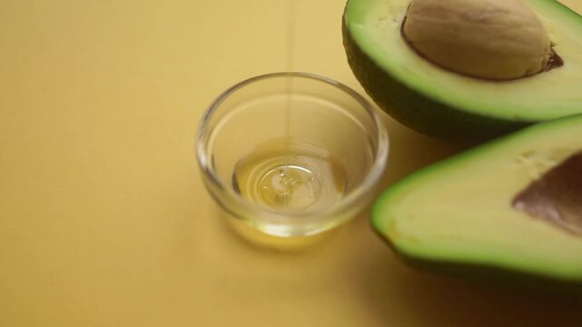 guacamole. Healthy food concept. close-up of fresh avocado fruit and oil flowing over black background healthy vegetarian delicious Breakfast Toas