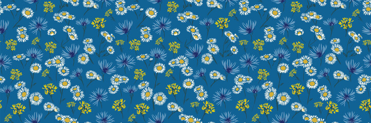 Seamless vector floral pattern with white daisies, yellow wildflowers, and blue cornflowers on a deep blue background. Designs for fabrics, wrapping paper, and spring decor