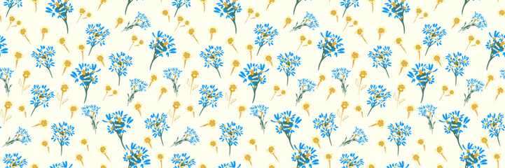 Seamless vector floral pattern with blue and yellow wildflowers on a light cream background. Elegant meadow inspired design for fabric, wallpaper, wrapping, decor