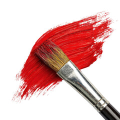 A brush dipped in bright red paint makes bold strokes on a clean surface, showcasing creative artistry in progress