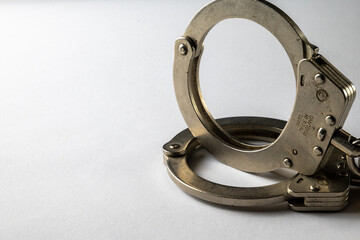 Metal Handcuffs and white background