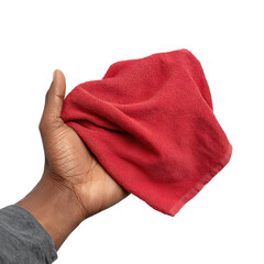 A person grips a red cleaning cloth tightly, showcasing its soft texture and vibrant color in a well-lit space