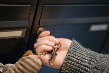 Hand opening mailbox with keys