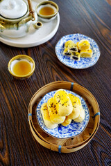 Chinese pastry dessert (Fresh milk mooncakes) with tea, Chinese culture sweet