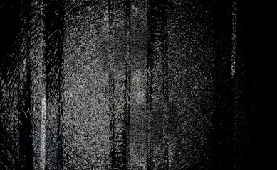 古い汚れたざらざらの質感の表面で黒、灰の色で暗い老いたイメージの模様でデザインした背景、壁紙、テクスチャ