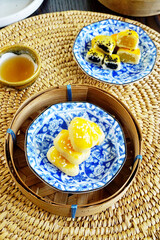 Chinese pastry dessert (Fresh milk mooncakes) with tea, Chinese culture sweet