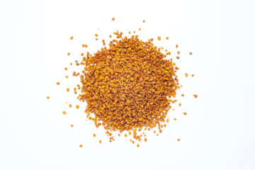 Pile of bee pollen grains isolated on white background. Top view