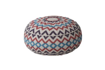 Stylish round knitted pouf with vibrant geometric patterns in off-white, red, blue, and dark blue, featuring a sunburst top design. background removed