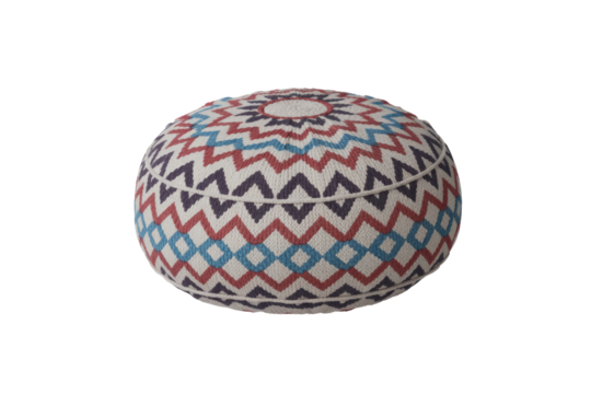 Stylish round knitted pouf with vibrant geometric patterns in off-white, red, blue, and dark blue, featuring a sunburst top design. background removed