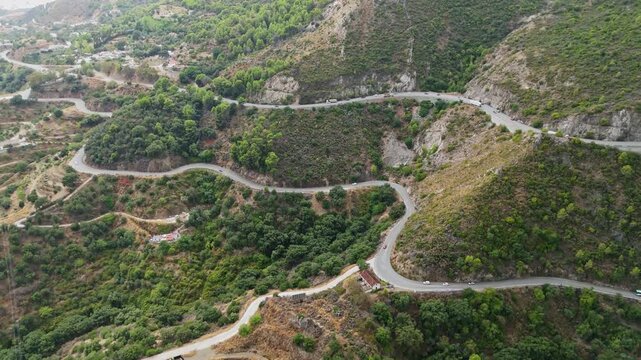 Aerial Landscape views of Ojen town. Ojen is a town and municipality that sits in the mountains behind Marbella in the autonomous community of Andalusia in southern Spain. Ambient drone exploration.