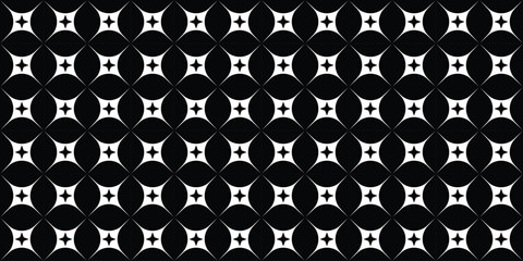 Intricate black and white pattern featuring interconnected circles and diamond shapes creating a visually appealing design