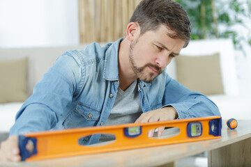 a professional builder evaluating furniture