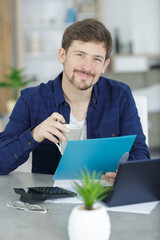 man working from home on social media