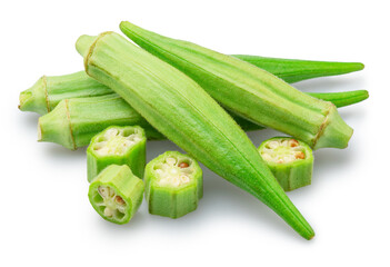 Fresh picked okra green seed pods and slices isolated on white background. File contains clipping path.