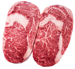 Raw ribeye steaks on white background. File contains clipping path.