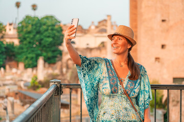 08 08 2025 Rome, Italy - Woman posing near Roman Forum in summer light