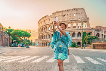 08 08 2025 Rome, Italy - Happy woman walking near Colosseum at sunrise