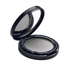 Gray eyeshadow in a compact case is open on a flat surface, showcasing its smooth surface and mirror inside