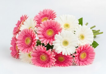 Beautiful arrangement of pink and white gerbera daisies with green stems and leaves