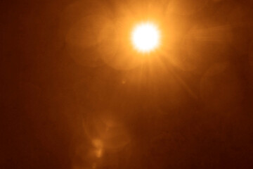 Dazzling sunshine sun rays with bokeh on yellow background. golden sunny banner with sunburst sunbeams. Abstract colorful template illustration. blurred image. shiny sun, sunbeams sunrays, sunshine