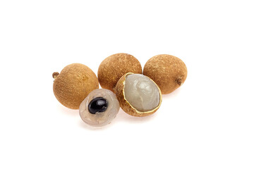 Longan tropical fruit displayed on a white background, showcasing its round shape, brown skin, and translucent flesh, highlighting its exotic appeal and delicious taste experience