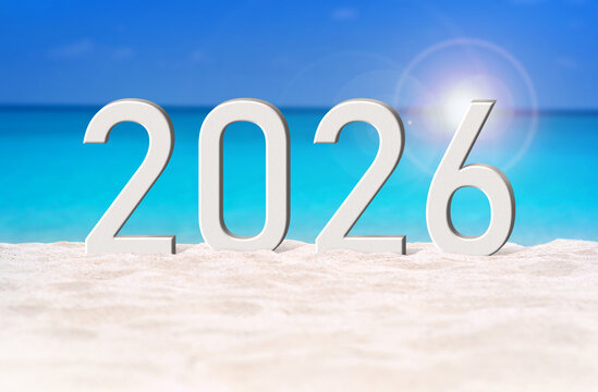Happy New Year 2026, lettering on white sand beach with clear blue sea background. Numbers 2026 year on sand dunes at the sea shore, celebrating new year concept, copy space.