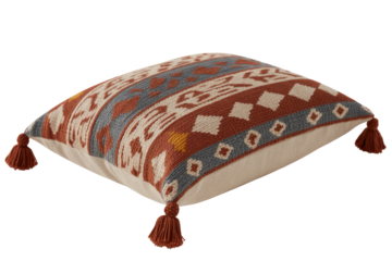 A vibrant square throw pillow featuring a rich terracotta, cream, grey, and yellow geometric pattern, accented with decorative corner tassels. background removed