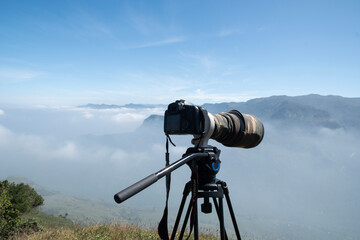 camera on tripod against sky