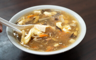 Delicious Hot and Sour Soup served in a bowl.