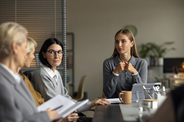 Group of Caucasian Young Adult Women Attending Business Meeting