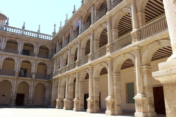 Elegant interior courtyard and arches of the historic University of Alcal&aacute; near Madrid, Spain, showcasing Renaissance design and cultural heritage July 2024