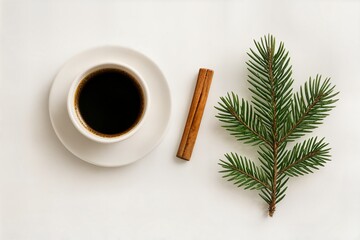 Minimalist winter flat lay with cup of coffee, cinnamon stick and fir branch on white background, cozy morning Christmas mood