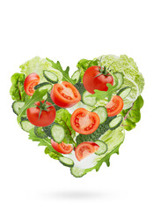 Bright fresh vegetables as heart shape. Salad ingredients - arugula, tomatoes, cucumber, leafy greens fly as heart on green background. Great for farm-fresh produce, culinary advertising, design.