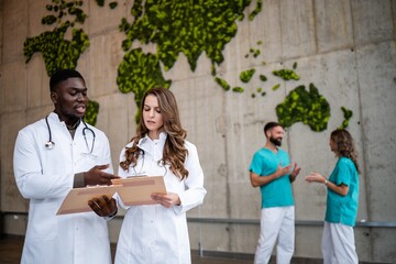Diverse doctors collaborating on global health initiative