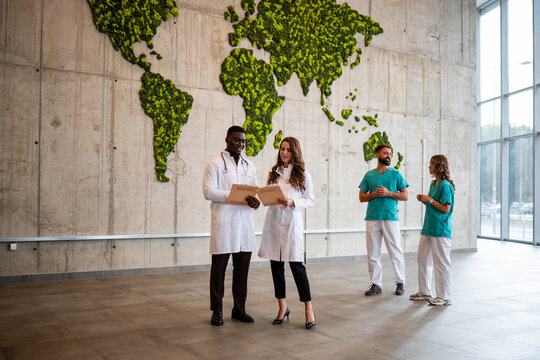 Diverse medical team discussing global healthcare issues