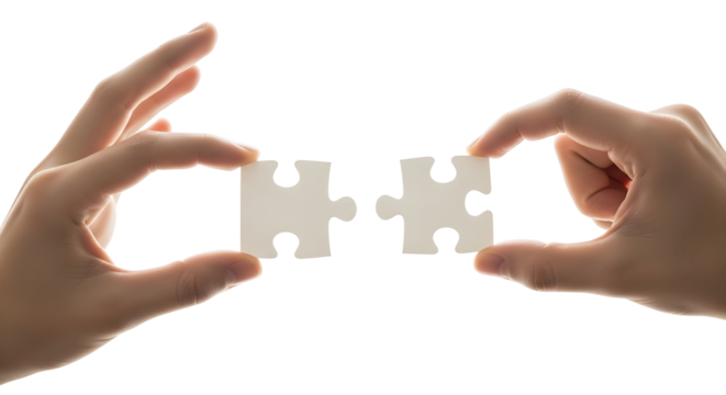 Human hands bringing two white jigsaw puzzle pieces together, symbolizing concepts of connection, teamwork, partnership, and strategic problem-solving for successful outcomes