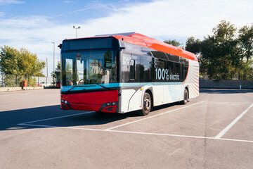 Modern electric bus parked outdoors, showcasing future of green urban transportation and zero emissions
