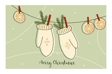Winter holiday illustration, mittens and orange slices hanging on a rope