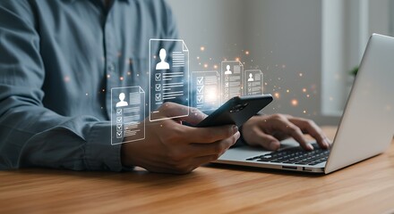 HR manager using a smartphone and laptop for online recruitment. Digital resume screening and candidate selection process. Human resources technology concept