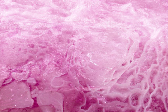 Pink marble texture. Pink water bubbles on the surface ripples. Defocus blurred transparent pink colored clear calm water surface texture with splash and bubbles. Water waves with shining pattern text - Powered by Adobe