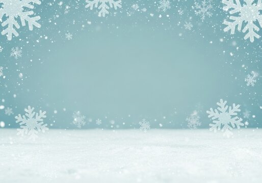 Soft blue winter background with snowy ground, falling snow, and large decorative snowflakes