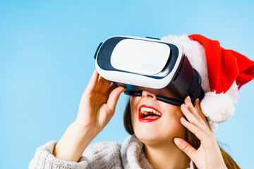 Girl watching 3d film tour in virtual reality glasses.
