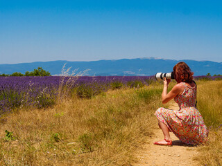 Woman take photo on lavender field, Provence France