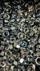 close up of a pile of metal screws