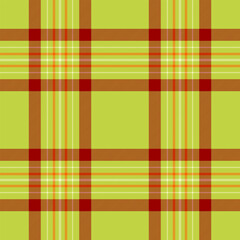 Classic plaid pattern in shades of green, brown, red, orange, and white.  Seamless repeat.  Ideal for fashion, textiles, backgrounds, or festive designs. Heritage style.