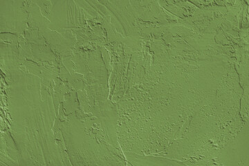 Close up, macro of khaki painted textured stucco wall with rough plaster, concrete surface texture. Abstract background, backdrop for design, wallpaper art or decoration projects.